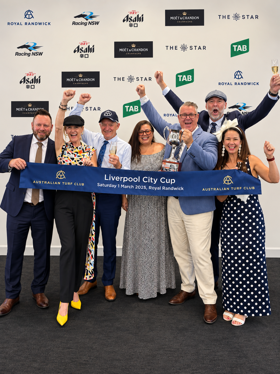 Champion Racing Club owners celebrating the Liverpool City Cup